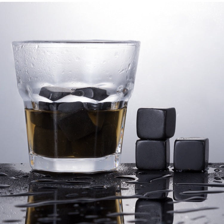 A wooden box for whiskey marble ice cubes