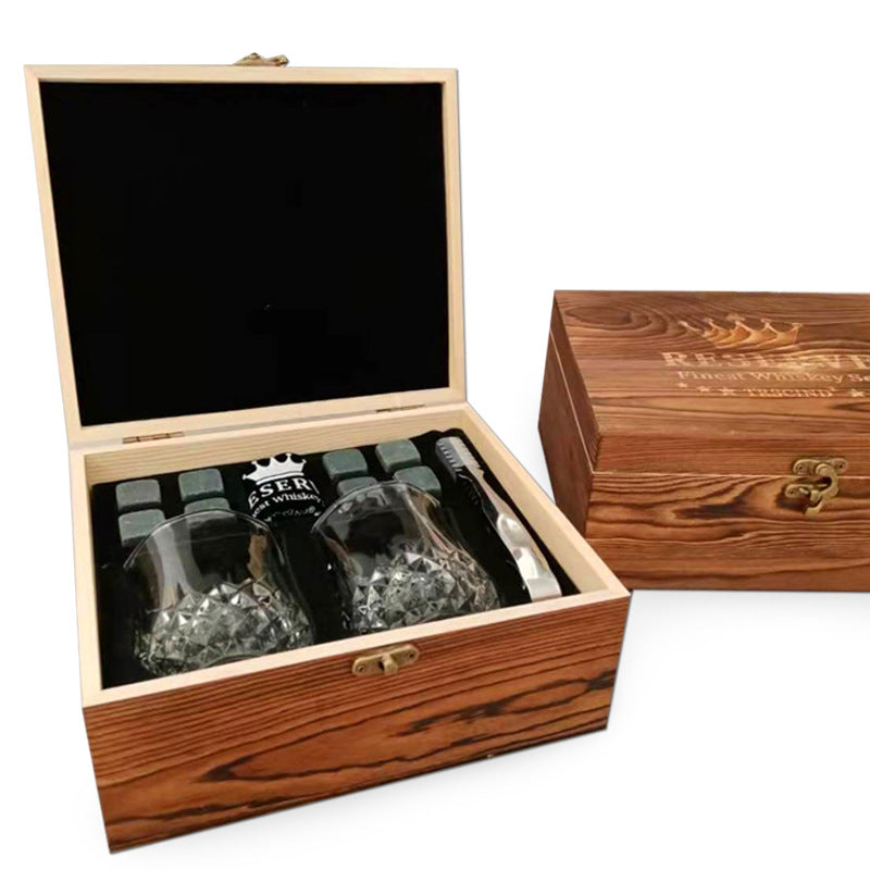 A wooden box for whiskey marble ice cubes